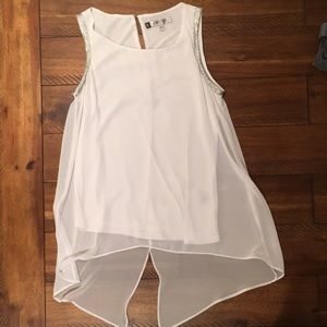 Flowing white and silver tank.